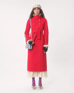 clutch-valentino-garavani-loco-in-tessuto-moire-con-logo-gioiello-indossata-da_modella-foto-collezione-brand-valentino