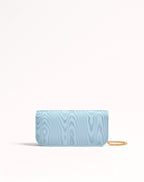 clutch-valentino-garavani-loco-in-tessuto-moire-con-logo-gioiello-retro